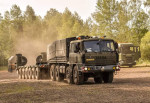 [Obrázek: Řízení vojenského nákladního auta Tatra 815]
